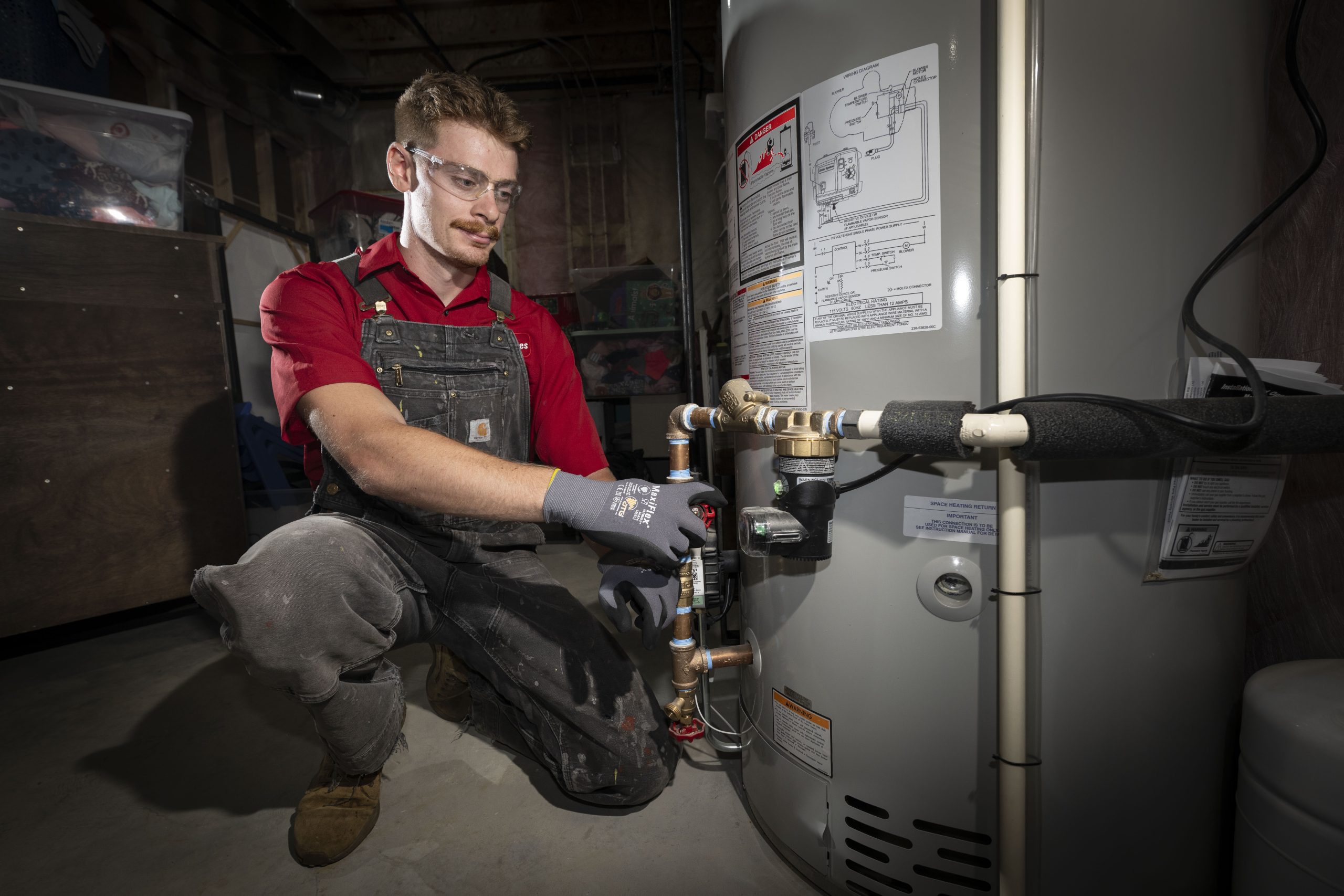 Plumber at Water Heater