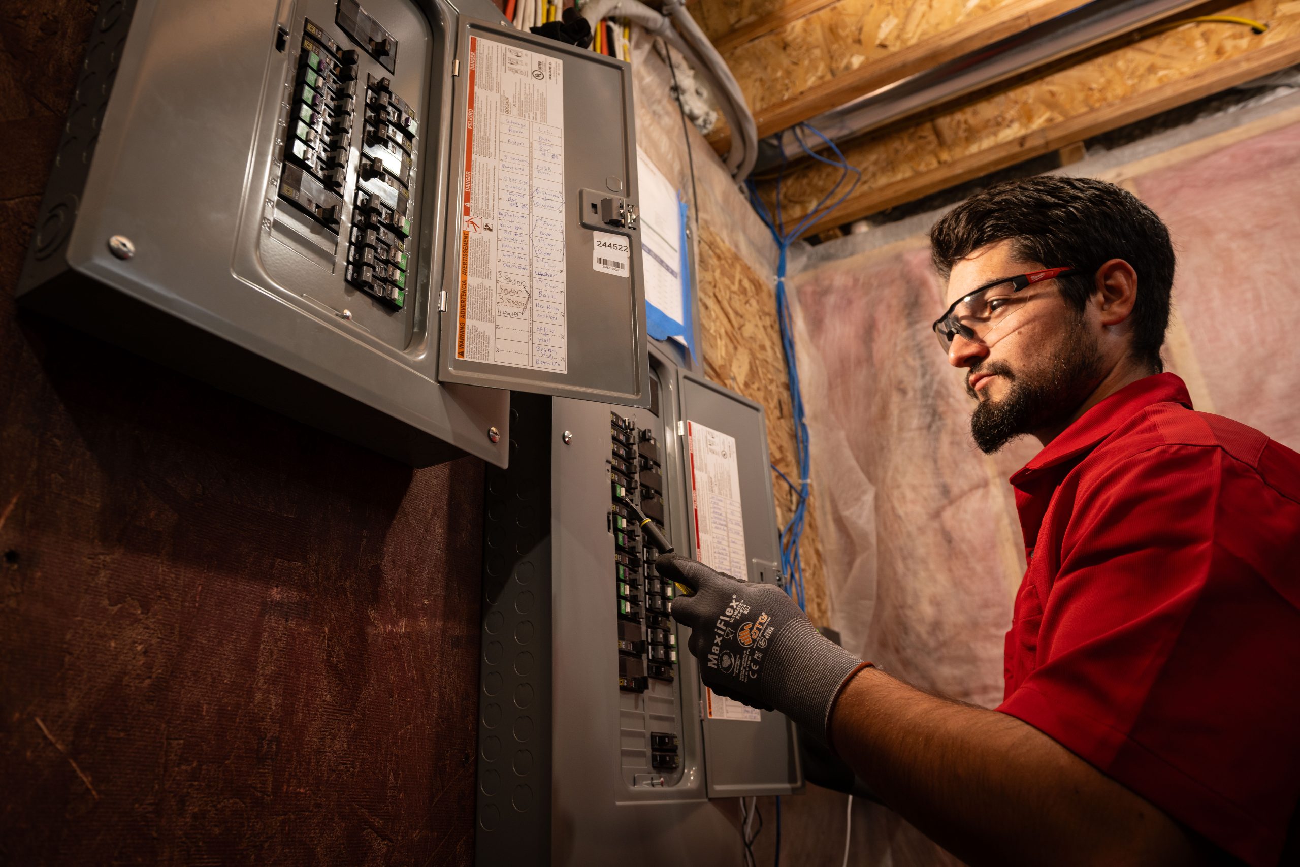 Dave Jones Electrician Inspecting Electrical Panel