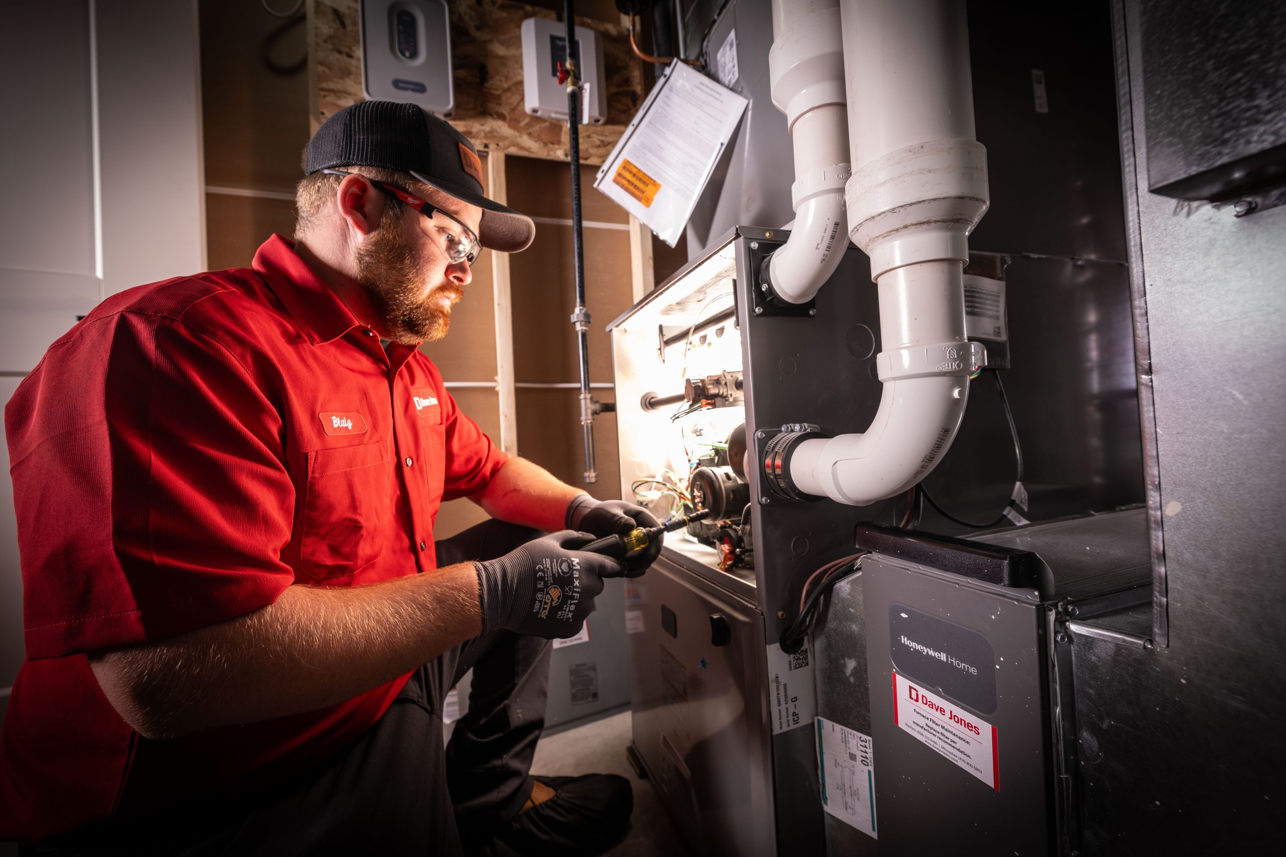 Dave Jones technician working on a furnace