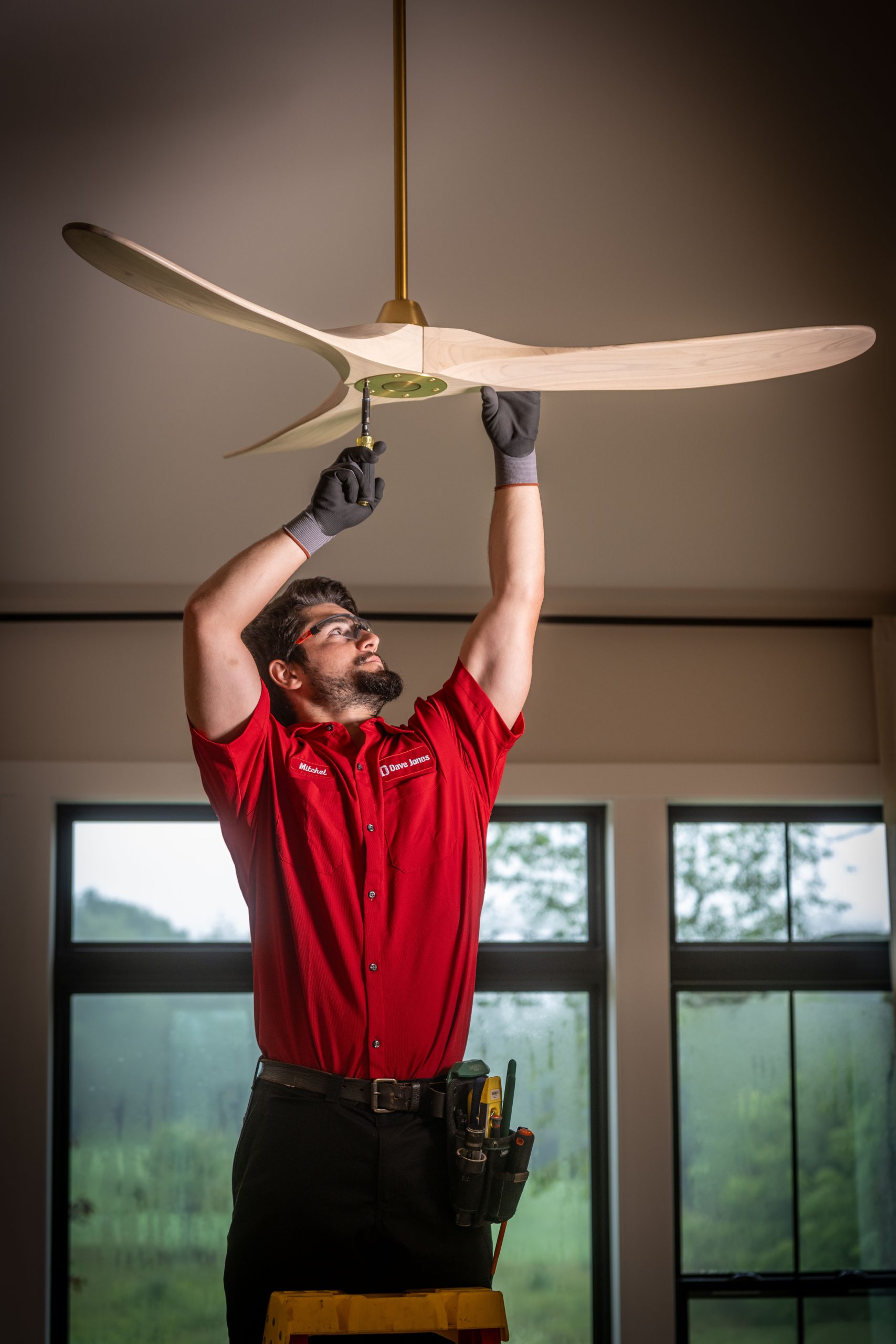 Electrician Installing Ceiling Fan