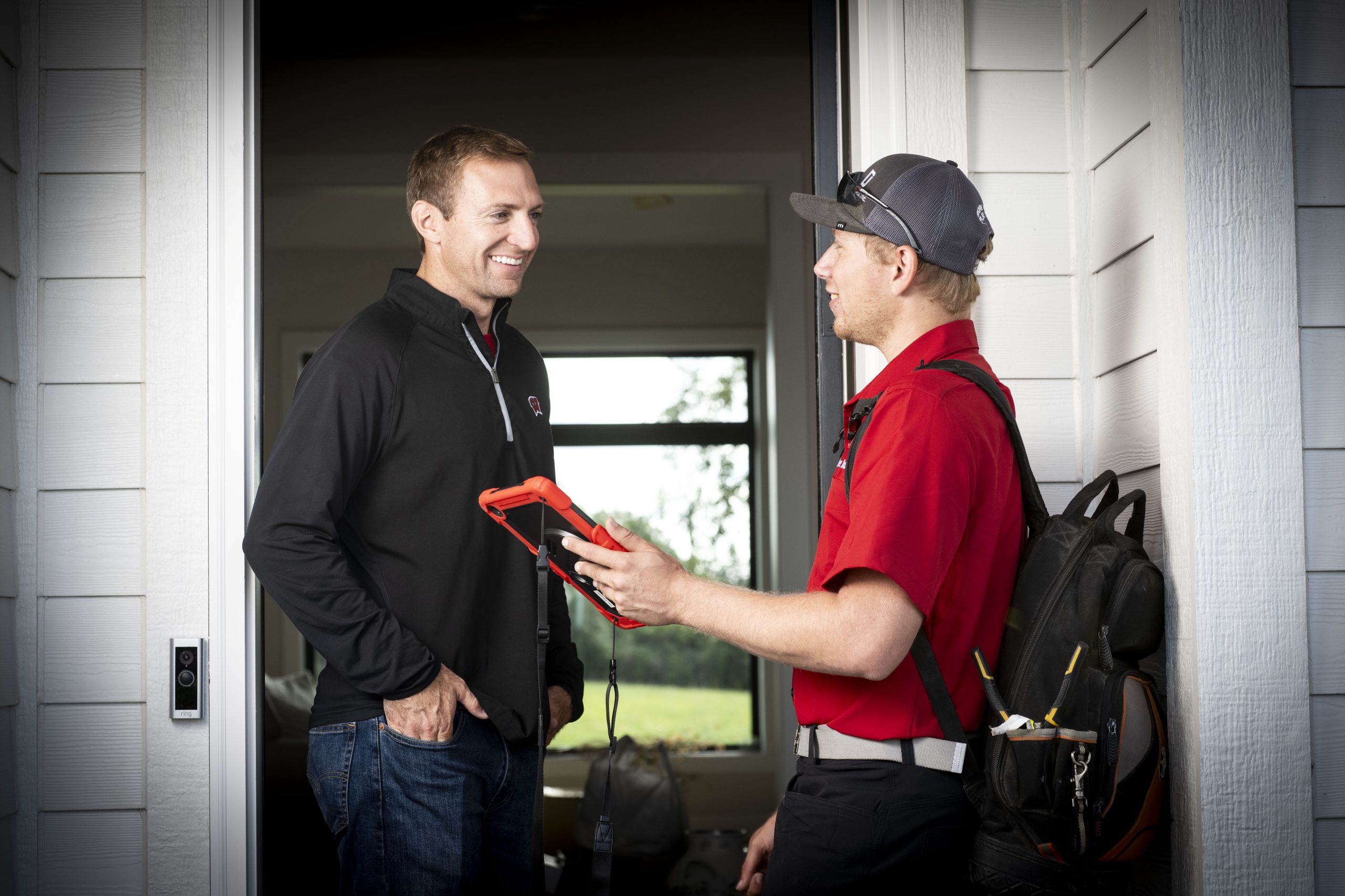Dave Jones technician talking with homeowner
