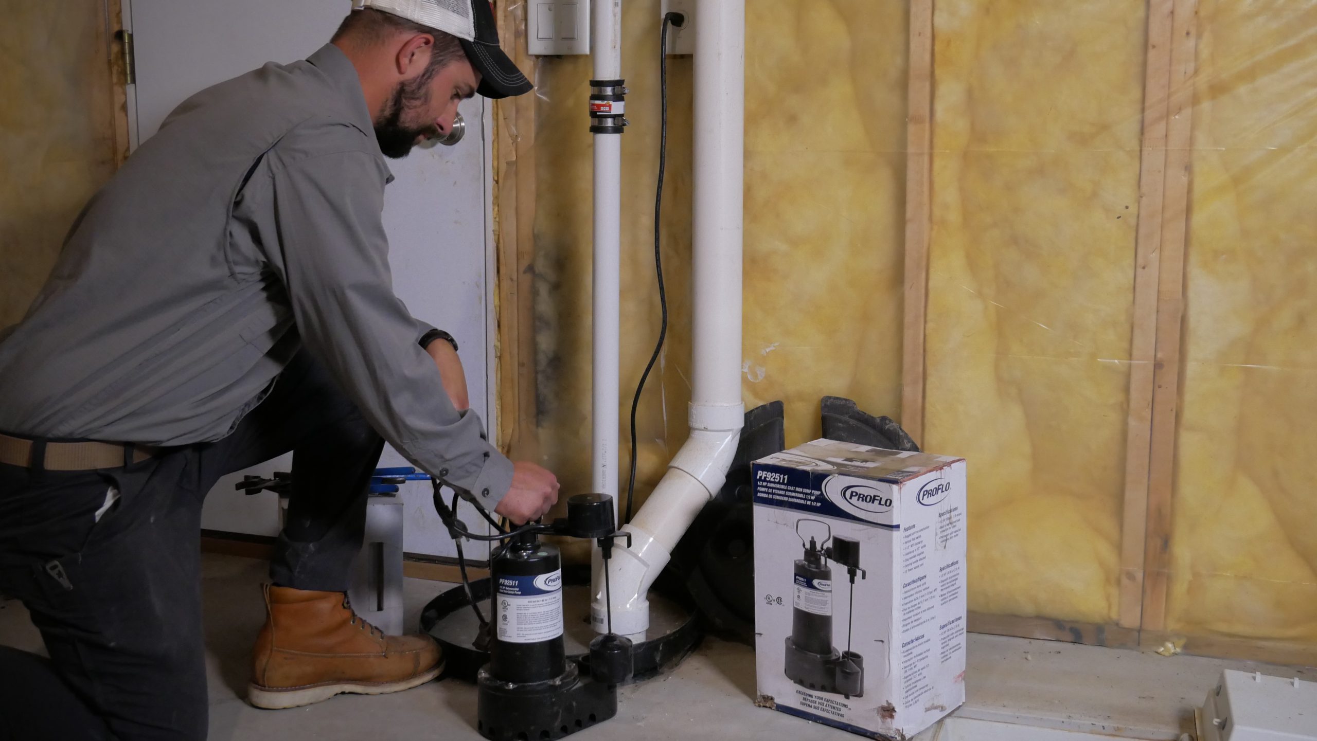Dave Jones Plumber installing sump pump